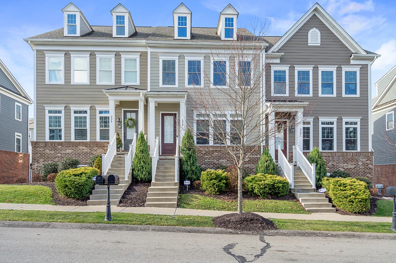 Bright townhome exterior of the kind commonly leased in Pittsburgh's suburbs